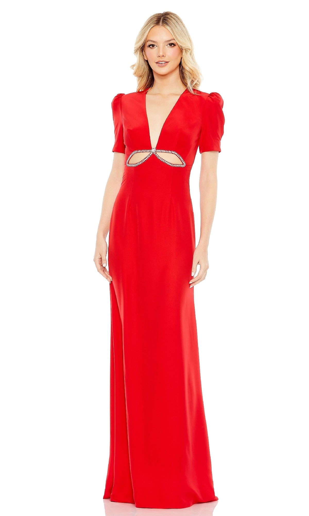 A woman wears the Mac Duggal 2630, a short-sleeve long formal dress in red featuring a plunging neckline, midriff cutout, and rhinestone accents.